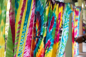 Multi-colored Batik fabric. Tie dye fabric. dry clothes in the sun