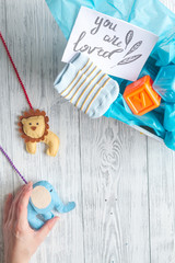 birth of boy - baby shower concept on wooden background