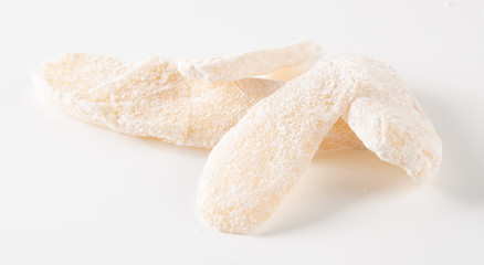 preserved fruits or dry ginger on the background.