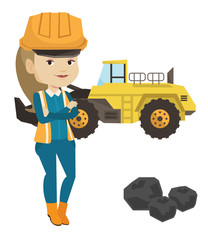 Miner with a big excavator on background.