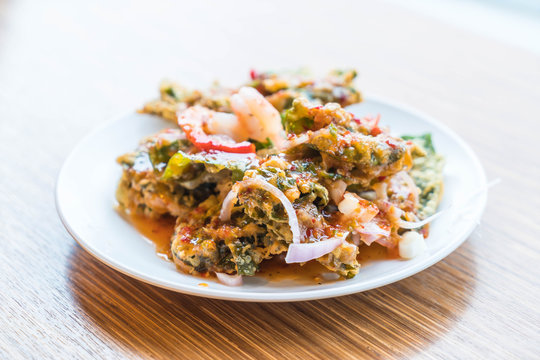 Crispy deep fried morning glory salad with shrimps