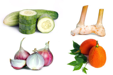 Cucumber, Ginger, shallot(onion), and gac fruit isolated on whit