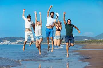 Friendship Freedom Beach Summer Holiday Concept - young people running