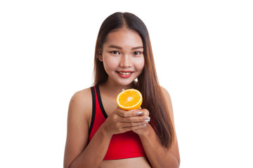 Beautiful Asian healthy girl with orange fruit.