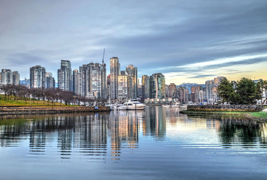Sunset at city harbor. False Creek from Granville Island. Yaletown. Vancouver. British Columbica. Canada.