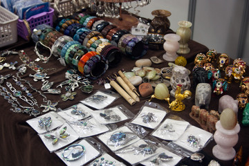 Brooches, figurines and accessories made from semi-precious stones on the market