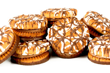 Chocolate cookies round shape closeup on a white background.