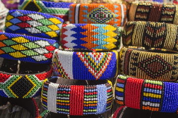 African bright colorful beads bracelets. Local market. Fashion accessories.