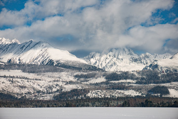 Fototapeta na wymiar Winter landscape, snow covered mountain range. View of High Tatras, Slovakia
