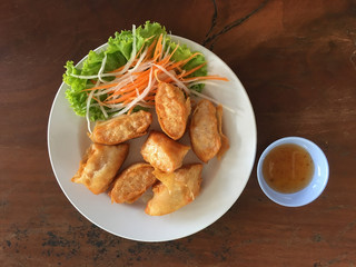 Deep fried shrimp rolls  serve with sweet sauce that found in Ea