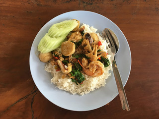 Spicy sea food and basil leaves. Served with rice, Thai traditio