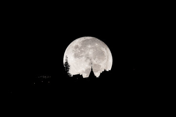 moon with silhouette temple, Chiang Mai, Thailand.