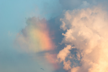Sunlight cloud and sky at sunset with rainbow.