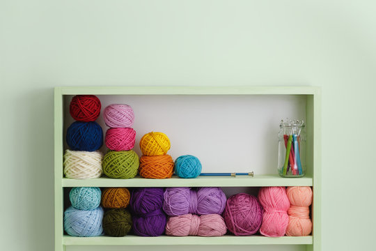 Colorful Balls Of Wool On Shelves