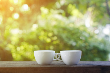 Cup of tea on wooden table.