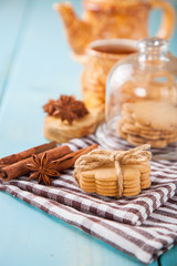 Fototapeta na wymiar cookies with cinnamon and tea on a table, selective focus, copy space