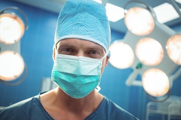 Fototapeta na wymiar Portrait of male surgeon wearing surgical mask