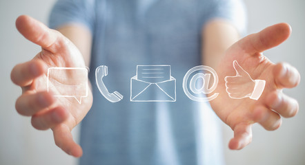 Businessman holding manuscript contact icon in his hand