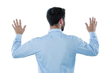 Businessman pretending to touch an invisible screen