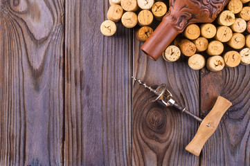  bottle of wine with corks on wooden table background