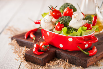 mushrooms and vegetables on a table, selective focus, copy space
