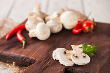 mushrooms and vegetables on a table, selective focus, copy space