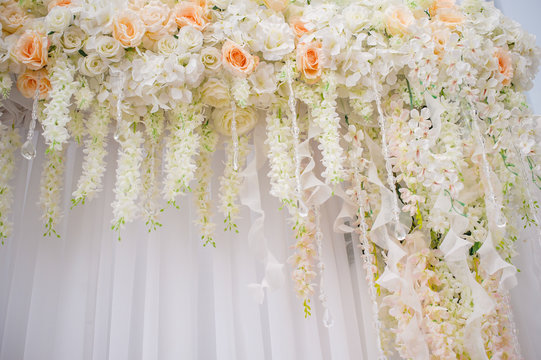 beautiful arch decorated with flowers for wedding ceremony