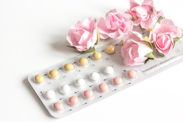 concept of female contraception on white background