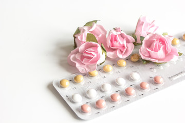 concept of female contraception on white background