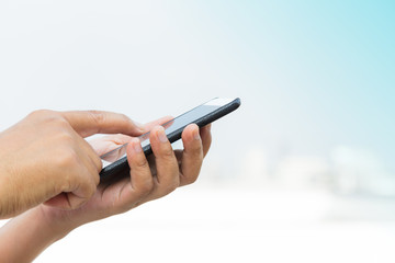 Man using mobile smart phone outdoor