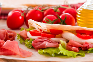 Piadina with ham and lettuce. 