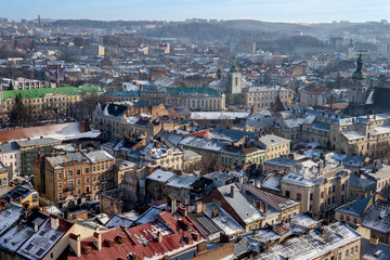 Obraz premium Winter panorama - landscape of Lvov in sunny day from tower
