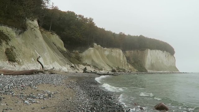 Rugen island chalk rock cliff landscape in autumn time. colorful beech tree forest. (Mecklenburg-Vorpommern, Germany). Baltic sea