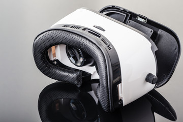 Virtual reality goggles on black surface