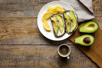 making sandwiches with avocado healthy organic food top view