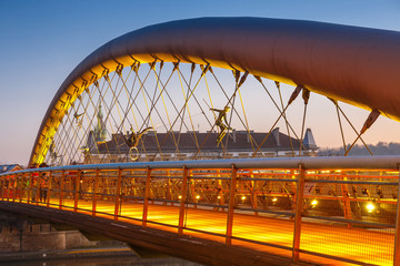 Fototapeta premium Bernatka footbridge over Vistula river in Krakow, Poland
