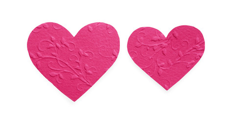 Bright pink patterned paper hearts isolated on white background, valentine