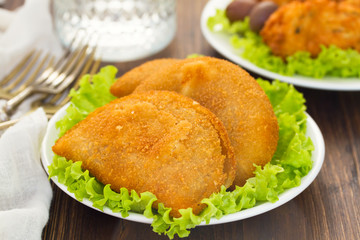 typical portuguese snack ricoes de carne