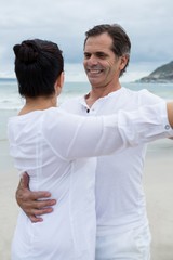 Romantic couple dancing on beach