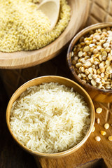 Assorted grain in wooden bowls