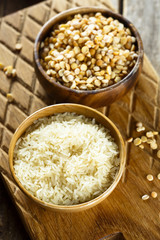 Assorted grain in wooden bowls