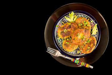 Piece of homemade fried pea chikpea fritter on fork