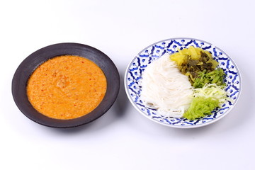 Rice noodle and fish curry in coconut milk with herb.