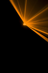 Laser beam orange on a black background