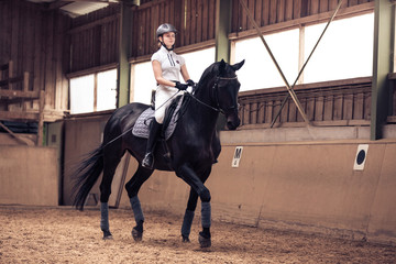 Young Girl Riding Her Horse