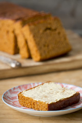 Fototapeta na wymiar Traditional Dutch spice bread or 'ontbijtkoek' with butter