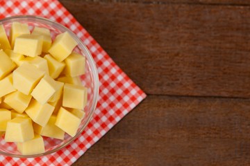 Cheese cubes in bowl on cloth napkin