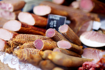Fototapeta na wymiar Selection of assorted home made sausages on a farmer's market