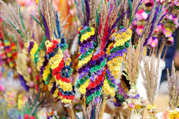 Traditional Lithuanian Easter palm known as verbos sold on Easter market in Vilnius, Lithuania © MNStudio