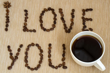 I love you sign with coffee beans and cup of coffee
